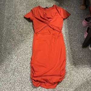 Large ribbed orange open in the belly dress never worn